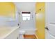 Bathroom with shower, toilet, vanity, and tiled floor at 2980 Siesta Dr, Venice, FL 34293