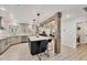 Spacious kitchen featuring a large island with bar seating and modern appliances at 307 Bucknell Rd, Venice, FL 34293