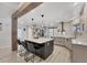 Stylish kitchen with a large island, pendant lighting, and modern appliances at 307 Bucknell Rd, Venice, FL 34293