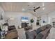 Cozy living room featuring a vaulted ceiling and modern furnishings at 307 Bucknell Rd, Venice, FL 34293