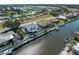 Waterfront home with a private pool and boat dock on a canal with access to the Gulf at 318 Oakwood Cir, Englewood, FL 34223