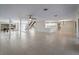 Spacious living area featuring an open floor plan and modern finishes at 318 Oakwood Cir, Englewood, FL 34223