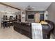 Spacious open-concept living area with kitchen island seating and a comfortable seating area with stylish decor at 3255 Tally Ho Rd # 1, North Port, FL 34291