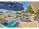 Backyard with an in-ground pool and spa at 421 Blackburn Rd, Nokomis, FL 34275