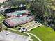 Aerial view of tennis courts, bocce ball and green space at a lovely recreation park at 4213 Vicenza Dr # A2, Venice, FL 34293