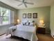 Comfortable bedroom with bright windows, ceiling fan and nice decor at 4213 Vicenza Dr # A2, Venice, FL 34293
