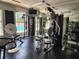 A well equipped gym overlooking a pool featuring state of the art exercise machines at 4213 Vicenza Dr # A2, Venice, FL 34293