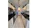 Modern kitchen features stainless steel appliances, granite countertops, and ample cabinet space at 4213 Vicenza Dr # A2, Venice, FL 34293