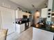 Bright kitchen with granite countertops, stainless steel appliances, and ample storage space at 4213 Vicenza Dr # A2, Venice, FL 34293