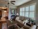 Cozy living room with neutral decor, plantation shutters, and an open layout at 4213 Vicenza Dr # A2, Venice, FL 34293