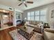 Comfortable living room with plantation shutters, neutral tones, and an open layout at 4213 Vicenza Dr # A2, Venice, FL 34293