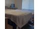 Bedroom with a ceiling fan, window with blinds, and a comfortable bed with blankets at 469 Albee Farm Rd # V19, Venice, FL 34285