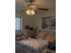 Bedroom featuring neutral walls and a window with blinds, providing a tranquil atmosphere at 469 Albee Farm Rd # V19, Venice, FL 34285
