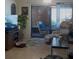 Cozy living room featuring comfortable seating and sliding glass doors leading to an outdoor space at 469 Albee Farm Rd # V19, Venice, FL 34285