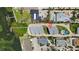 Aerial view of the property showing its location in a waterfront community with easy access to a dock and pool at 5031 N Beach Rd # 118, Englewood, FL 34223