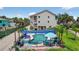 Outdoor pool area featuring lounge chairs, shade, and a well-maintained pool, perfect for relaxation and recreation at 5031 N Beach Rd # 118, Englewood, FL 34223