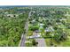 Aerial view of residential area showcasing tree-lined streets and cozy homes at 5106 S Lockwood Ridge Rd, Sarasota, FL 34231