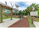 Park entrance to the Red Bug Slough Preserve. Picnic benches, a swing and landscaping are included at 5106 S Lockwood Ridge Rd, Sarasota, FL 34231