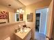 Bathroom featuring a vanity with a sink, tile floors, and a mirror at 525 Manatee Ct # 13, Venice, FL 34285