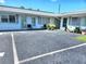 Charming condo exterior with parking and maintained landscaping at 525 Manatee Ct # 13, Venice, FL 34285