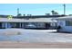 Exterior view of building in a condo community near a beach at 525 Manatee Ct # 13, Venice, FL 34285
