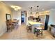 Inviting kitchen with stainless steel appliances, barstool seating, and tiled floors at 525 Manatee Ct # 13, Venice, FL 34285