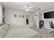 Bedroom offering great lighting, a television, and a work station with monitors at 5264 Albion Rd, Venice, FL 34293