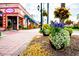 Beautiful street view with vibrant flower pots and manicured landscaping in Venice at 5264 Albion Rd, Venice, FL 34293
