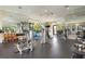 This well-equipped gym offers a variety of exercise options with ample natural light at 5856 Semolino St, Nokomis, FL 34275