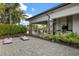 Outdoor patio with barbeque, dining table and games for entertaining guests at 5856 Semolino St, Nokomis, FL 34275