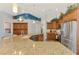 Open kitchen featuring granite counters, stainless steel appliances and breakfast bar with seating at 5868 Jefferson Rd, Venice, FL 34293