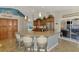 Spacious kitchen with granite counters, breakfast bar with seating, and stainless steel appliances at 5868 Jefferson Rd, Venice, FL 34293
