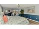 Relaxing main bedroom with pool view, stylish accents, and a coastal color palette at 5868 Jefferson Rd, Venice, FL 34293