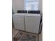 Laundry area with side-by-side washer and dryer at 603 Auburn Lakes Cir # 603, Venice, FL 34292