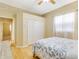 Bedroom features hardwood floors, a closet and bright window at 622 Pine Ranch East Rd, Osprey, FL 34229