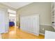 Bright bonus room features hardwood floors, a murphy bed, and plenty of natural light at 622 Pine Ranch East Rd, Osprey, FL 34229