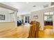 Hardwood floors flow from the formal dining room to the living room and kitchen at 622 Pine Ranch East Rd, Osprey, FL 34229