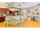 Kitchen with breakfast bar seating, stainless appliances, and an open layout at 622 Pine Ranch East Rd, Osprey, FL 34229