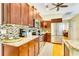 Well-equipped kitchen with stainless steel appliances, mosaic backsplash, and granite countertops at 622 Pine Ranch East Rd, Osprey, FL 34229