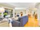 Spacious living room provides access to the outdoor pool and lanai through sliding glass doors at 622 Pine Ranch East Rd, Osprey, FL 34229