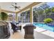 Covered patio featuring an outdoor seating area with a view of the pool at 622 Pine Ranch East Rd, Osprey, FL 34229