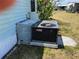 Close-up of modern AirTemp air conditioning unit ensuring year-round comfort at 6741 Laurel Ct, North Port, FL 34287