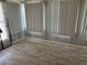 Bright sunroom with tile flooring, vertical blinds, and lots of light at 6741 Laurel Ct, North Port, FL 34287