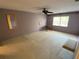 Spacious bedroom with natural light and a ceiling fan at 7560 Fairway Woods Dr # 305, Sarasota, FL 34238