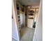 Walk-in closet with ample shelving and storage options, designed to keep your wardrobe organized and accessible at 7560 Fairway Woods Dr # 305, Sarasota, FL 34238