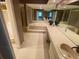 Bathroom with a bathtub and separated and sinks at 7560 Fairway Woods Dr # 305, Sarasota, FL 34238