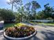 A well-maintained and lush entrance welcomes you to Fairway Woods at 7560 Fairway Woods Dr # 305, Sarasota, FL 34238