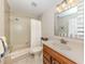 Clean bathroom with a shower-tub combination, vanity and neutral tones at 770 Village Cir # 232, Venice, FL 34292