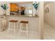 Kitchen bar with granite countertops and stainless steel appliances at 770 Village Cir # 232, Venice, FL 34292