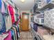 Spacious walk-in closet with ample shelving and storage for organization at 770 Village Cir # 232, Venice, FL 34292
